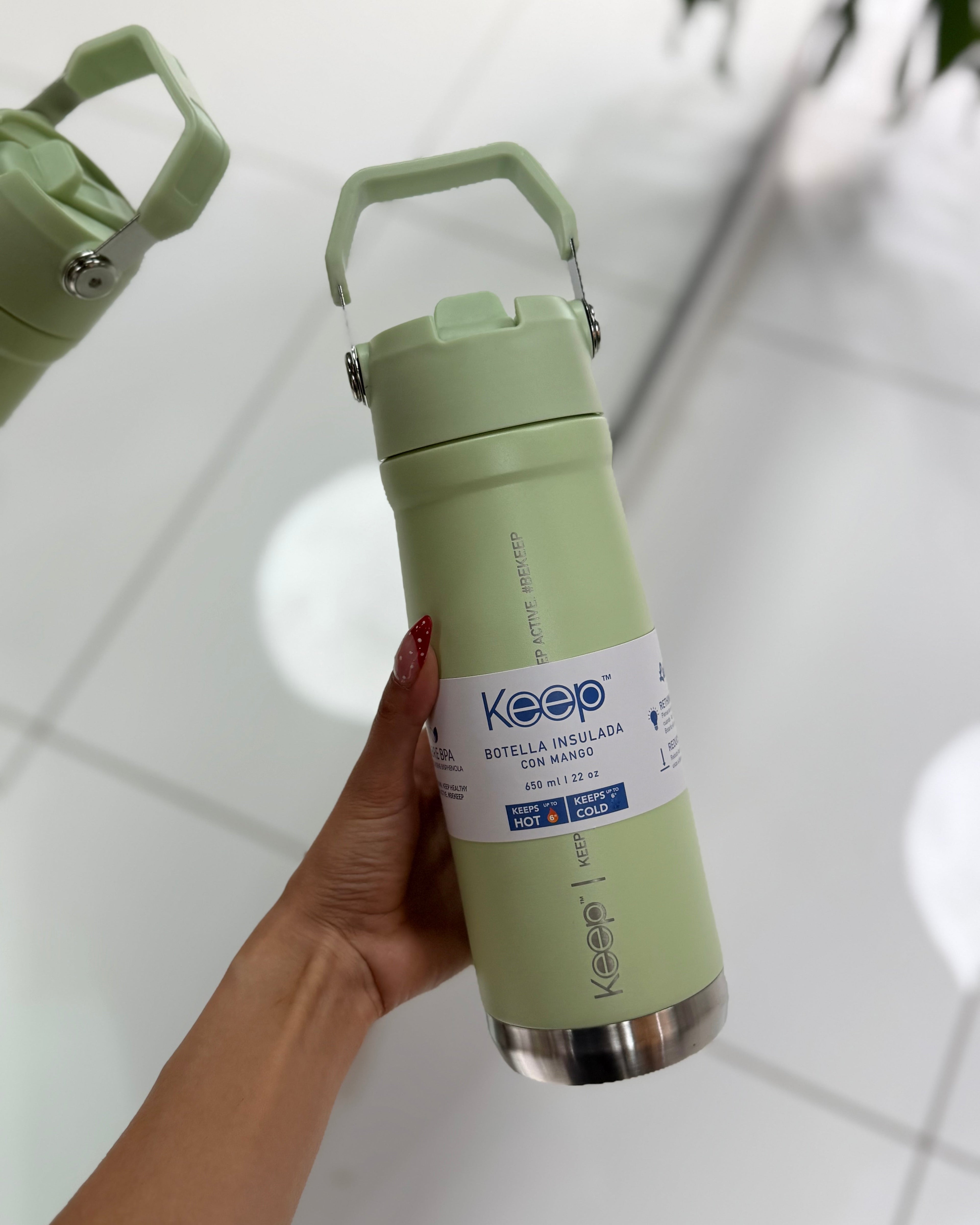 BOTELLA CON MANGO 650ML